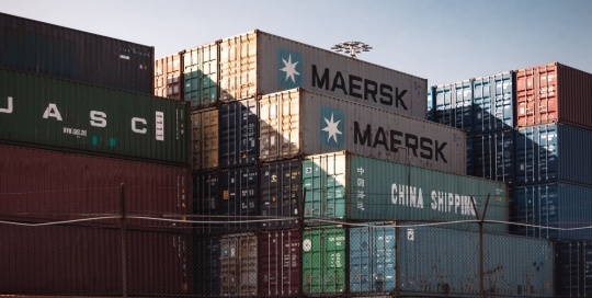 Stacked shipping containers at a port terminal